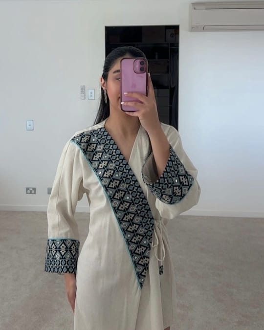 Cream linen kimono with bands of navy and cream Balochi embroidery